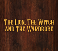 gold text on a dark wood background with the silhouette of a proud lion 