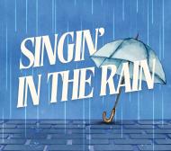 Blue water colour image of an umbrella and rain with the text singin in the rain