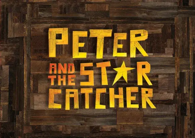 brown timber background with yellow wood letters of the title