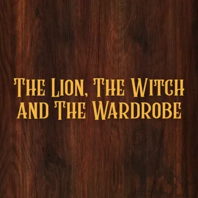 gold text on a dark wood background with the silhouette of a proud lion 