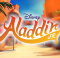 A curtain warmer of a desert marketplace and Disney's Aladdin JR logo