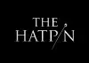 White text of "The Hatpin" on a black background. The i is replaced with an image of a hat pin.